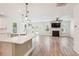 Open concept living space with modern appliances, fireplace, and patio access at 206 Almond Ct, Summerville, SC 29483