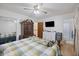 Bedroom with hardwood floors, ceiling fan, neutral paint and a view to an ensuite bathroom at 212 Columbia Dr, Ladson, SC 29456