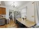 Bright kitchen with a dining area, stainless steel appliances, and natural light at 212 Columbia Dr, Ladson, SC 29456