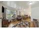 Comfortable living room with hardwood floors, neutral walls, and lots of natural light at 212 Columbia Dr, Ladson, SC 29456