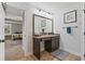 Well-lit bathroom with granite vanity, large mirror, and a bedroom visible through the doorway at 216 Foxbank Plantation Blvd, Moncks Corner, SC 29461