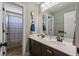 Spacious bathroom featuring a double vanity, a large mirror, and a separate shower area at 216 Foxbank Plantation Blvd, Moncks Corner, SC 29461