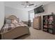 Bedroom boasts a ceiling fan and a neutral palette with plenty of space to study at 216 Foxbank Plantation Blvd, Moncks Corner, SC 29461
