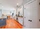 Spacious kitchen with stainless steel appliances, kitchen island, and wooden floors at 216 Foxbank Plantation Blvd, Moncks Corner, SC 29461
