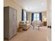 Bright living room with two couches, a coffee table, and a cabinet for storage at 216 Foxbank Plantation Blvd, Moncks Corner, SC 29461