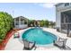 The in-ground swimming pool has chairs surrounding it and a barbeque shelter at 216 Foxbank Plantation Blvd, Moncks Corner, SC 29461
