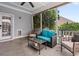 Relaxing screened porch with comfortable seating and a view of the backyard at 216 Foxbank Plantation Blvd, Moncks Corner, SC 29461
