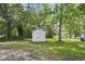 Spacious backyard features a shed for extra storage at 217 Quaker Rd, Saint George, SC 29477