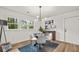 Cozy dining room features modern lighting and a stylish table setting near a bright window at 217 Quaker Rd, Saint George, SC 29477