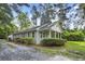 Charming one-story home with a welcoming front porch and well-maintained landscaping at 217 Quaker Rd, Saint George, SC 29477