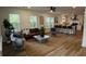 Bright, open-concept living space with barstool seating, modern lighting, and lots of natural light at 217 Quaker Rd, Saint George, SC 29477