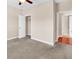 Neutral bedroom featuring neutral walls, carpet, ceiling fan and walk-in closet at 224 Sugarhouse Ct, Moncks Corner, SC 29461