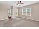 Neutral bedroom with carpet, a ceiling fan, and three large windows at 224 Sugarhouse Ct, Moncks Corner, SC 29461