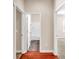 Hallway view of bathroom and other rooms with carpet at 224 Sugarhouse Ct, Moncks Corner, SC 29461