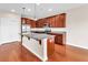 Kitchen features granite countertops, stainless steel appliances, and wooden floors at 224 Sugarhouse Ct, Moncks Corner, SC 29461