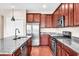 Kitchen with stainless steel appliances, granite countertops, and ample cabinet space at 224 Sugarhouse Ct, Moncks Corner, SC 29461