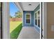 View from the patio of the backyard featuring a window and grass at 224 Sugarhouse Ct, Moncks Corner, SC 29461
