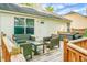 Relax on this outdoor deck with comfy seating, great for get-togethers and enjoying the weather at 2701 Four Winds Pl, Mount Pleasant, SC 29466
