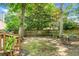 Private fenced backyard with lush greenery, ideal for relaxing and enjoying outdoor living in a tranquil setting at 2701 Four Winds Pl, Mount Pleasant, SC 29466