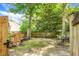 Fenced backyard with a grassy lawn, perfect for outdoor activities and gardening in a private setting at 2701 Four Winds Pl, Mount Pleasant, SC 29466