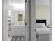 The primary ensuite bathroom has a bright vanity and leads to the main bedroom at 2701 Four Winds Pl, Mount Pleasant, SC 29466