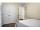 Cozy bedroom featuring double door closets and warm decor for comfort at 2701 Four Winds Pl, Mount Pleasant, SC 29466