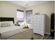 This bedroom is a serene retreat with a neutral color palette and ample natural light at 2701 Four Winds Pl, Mount Pleasant, SC 29466