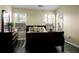 Serene bedroom with large windows, allowing for plenty of natural light, and a sleigh bed at 2701 Four Winds Pl, Mount Pleasant, SC 29466