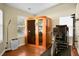 Exercise room featuring a sauna, exercise bike and wooden floors at 2701 Four Winds Pl, Mount Pleasant, SC 29466