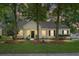Charming one-story home with mature trees, well-maintained lawn, and inviting front entrance at 2701 Four Winds Pl, Mount Pleasant, SC 29466