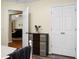 Hallway featuring a storage unit and doorway view to a living area, enhancing the home's flow at 2701 Four Winds Pl, Mount Pleasant, SC 29466
