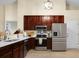 Well-lit kitchen featuring stainless steel appliances and modern cabinets at 2701 Four Winds Pl, Mount Pleasant, SC 29466