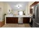 Open-concept kitchen featuring stainless steel appliances and a seamless connection to the living area, great for entertaining at 2701 Four Winds Pl, Mount Pleasant, SC 29466