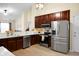 Well-equipped kitchen boasts stainless steel appliances and ample counter space at 2701 Four Winds Pl, Mount Pleasant, SC 29466