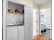 Laundry room featuring a washer and dryer, plus storage shelves for convenience and organization at 2701 Four Winds Pl, Mount Pleasant, SC 29466