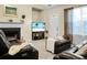 Cozy living room featuring a fireplace and comfortable, leather seating for relaxing or entertaining guests at 2701 Four Winds Pl, Mount Pleasant, SC 29466