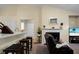 Spacious living room with a fireplace and a seamless transition to the kitchen area, perfect for modern living at 2701 Four Winds Pl, Mount Pleasant, SC 29466