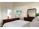 Comfortable main bedroom featuring a TV and a neutral color scheme at 2701 Four Winds Pl, Mount Pleasant, SC 29466