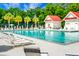 Large community pool with lounge chairs at 2701 Four Winds Pl, Mount Pleasant, SC 29466