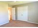 A bright bedroom features a closet and door way at 286 Westbrooke Rd, Summerville, SC 29486