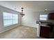 Bright dining area with decorative lighting and many windows at 286 Westbrooke Rd, Summerville, SC 29486
