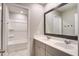 Bright bathroom featuring a double sink vanity, large mirror, and separate toilet and shower area at 309 Squire Pope Rd Rd, Summerville, SC 29486
