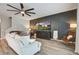 Open-concept living room with comfortable seating, modern decor, and lots of light at 309 Squire Pope Rd Rd, Summerville, SC 29486