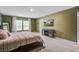 Spacious main bedroom with a plush bed, a view of the TV, and natural light from large windows at 309 Squire Pope Rd Rd, Summerville, SC 29486