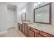 Bathroom with double sinks and tile flooring at 310 Marchman St, Summerville, SC 29486