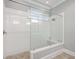 Modern bathroom featuring a glass-enclosed shower with built-in bench and neutral tile at 310 Marchman St, Summerville, SC 29486