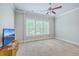 Spacious bedroom with large windows and a ceiling fan at 310 Marchman St, Summerville, SC 29486