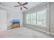 Bedroom with natural light, soft carpet, ceiling fan and a television at 310 Marchman St, Summerville, SC 29486