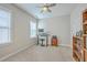 Bright bedroom featuring a dedicated computer desk and ample natural light at 310 Marchman St, Summerville, SC 29486
