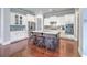Gourmet kitchen with a large island, stainless appliances, and custom white cabinets at 310 Marchman St, Summerville, SC 29486